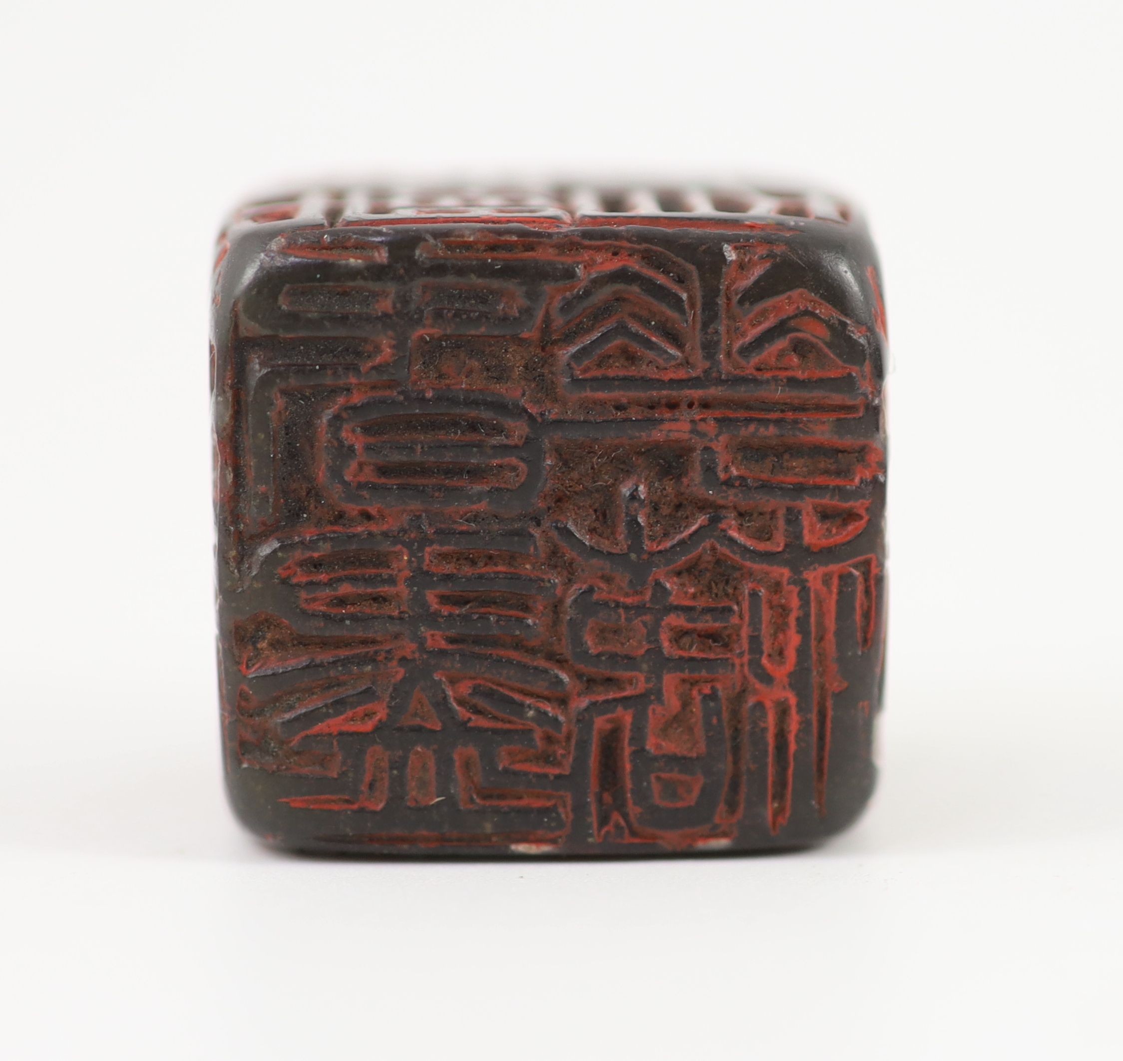 A Chinese dark green soapstone cube shaped seal, probably Qing dynasty, 3 cm
